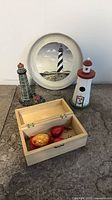 All items: plate, 2 figurines, wooden box with lobster