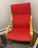 Front view showing full chair, red cushions, bentwood frame