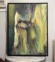 Front view of framed abstract painting