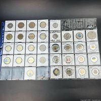 Overview of both binder pages of coins
