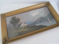 Front view of framed pastel landscape