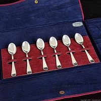 Six teaspoons in red-lined navy pouch, Argento 800 tag visible