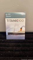 Front of Titanic 100 booklet showing value 6 × $1.80 and ship image
