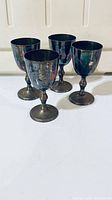 all four copper goblets front view
