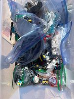 Close view of LEGO Mindstorms parts sorted in plastic bags