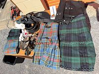 Kilts and accessories overview; brooch not primary focus