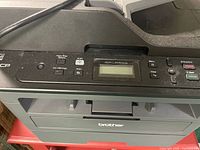 Top control panel showing model DCP-L2550DW and button layout