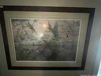 Front view of framed print showing image, mats and frame