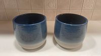 two blue gradient ceramic planters