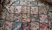 Full view of barkcloth patchwork showing floral squares and decorative border
