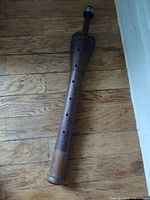 Full view of wooden textile spool