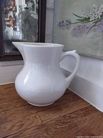 Front angled view showing overall form, handle and spout