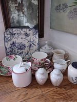 Overview of all china pieces grouped on tabletop