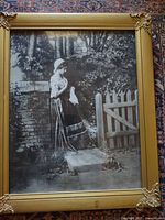 Full view of framed black and white print showing subject and frame