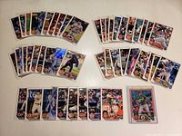 Wide view of all 51 rookie cards laid out in groups