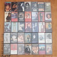 All 35 cassette tapes laid out in five rows