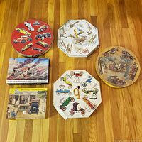 Group shot of six boxed vintage jigsaw puzzles on floor