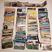 Overview of all postcard stacks and two panoramic accordion postcards