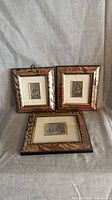 All three framed miniature artworks front view