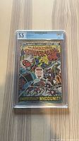 Front of CGC-slabbed Amazing Spider-Man #155 showing grade label 5.5