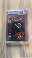 Front of CGC slab showing Amazing Spider-Man #316 cover and 8.5 grade