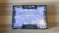 Back view of sealed Pokémon Deoxys VMAX & VSTAR Battle Box showing product details and seal intact