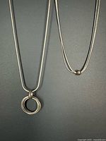 Both necklaces side by side to show overall style and length proportions