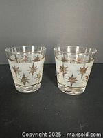 Front view of both tumblers showing starburst pattern