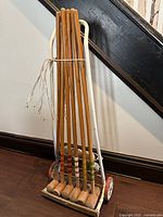 Full view of caddy holding mallets and balls