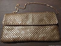 Front view of metallic mesh Esprit evening bag with chain strap