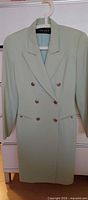Front view showing full blazer dress, lapels, buttons