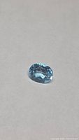 Top view of oval Swiss blue topaz
