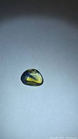 Top view of faceted blue-yellow sapphire