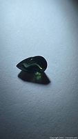 Pear-cut green sapphire front view