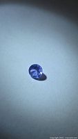 Front view of the round blue-purple tanzanite