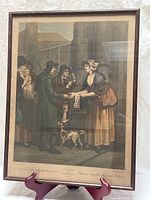 Full view of framed engraving under glass