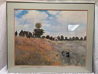 Full view of framed Monet “Poppies” print with mat and frame visible