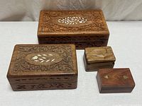 Group shot of four wooden trinket boxes