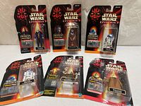 Group shot of all six blister-carded figures