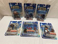 Group shot of all six carded figures