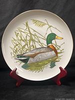 Front view of plate on stand showing full mallard illustration