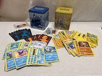 Full lot with cards spread, two tins, dice, coin, markers visible