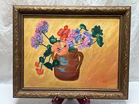 Frontal view of framed oil painting showing full artwork and frame details