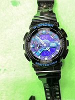 Front view of Casio G-Shock watch showing full dial and strap