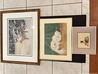 All three framed cat artworks side by side