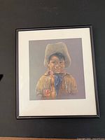 Full view of framed cowboy boy print with mat and frame