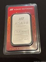 Front of sealed Asahi 1 oz silver bar showing weight and purity