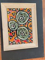 Full view of framed painting