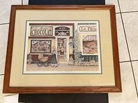 Full view of framed Janice Tanton print with mat and wood frame