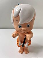 Front view of Bamm Bamm figure showing facial details and outfit